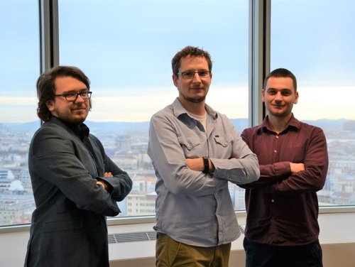 Teamfoto vom InfPro-Office im Millennium Tower in Wien